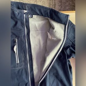 Players dark blue jacket